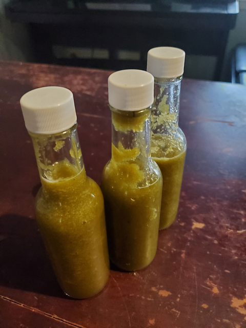 Three jars of hot sauces