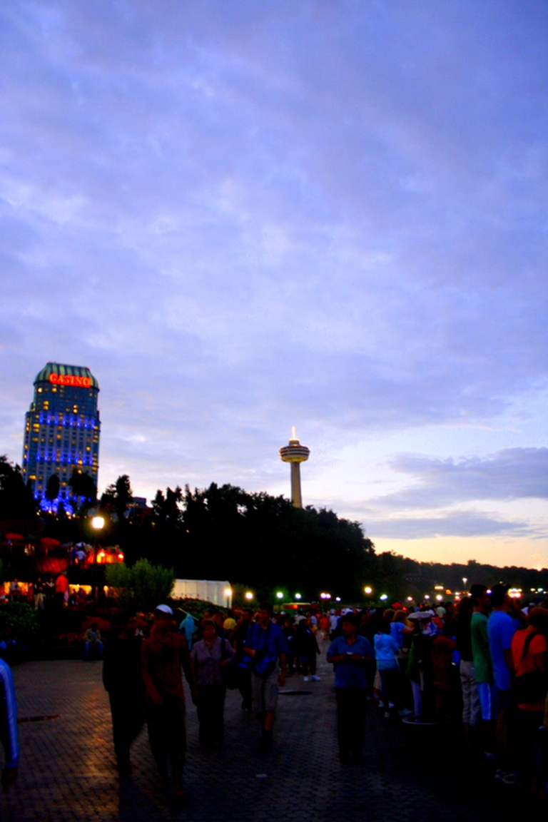 A crowd gathers to watch the sunset at Niagara Falls