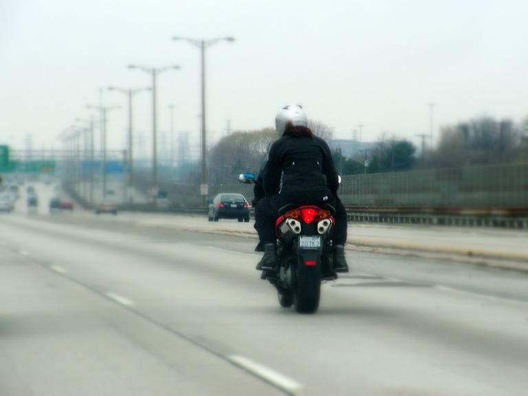 A couple on a motorcycle